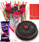 Bouquet of 6 roses with Card and 1/2 kg cake 1 silk chocolate
